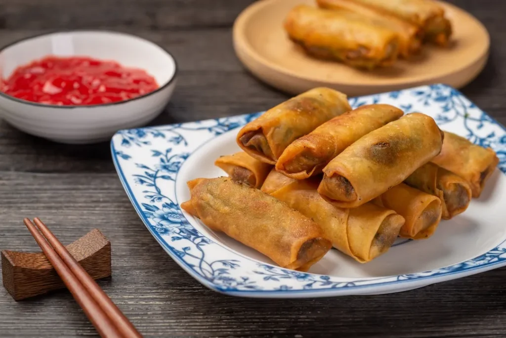 Delicious fried spring rolls and sweet chili sauce